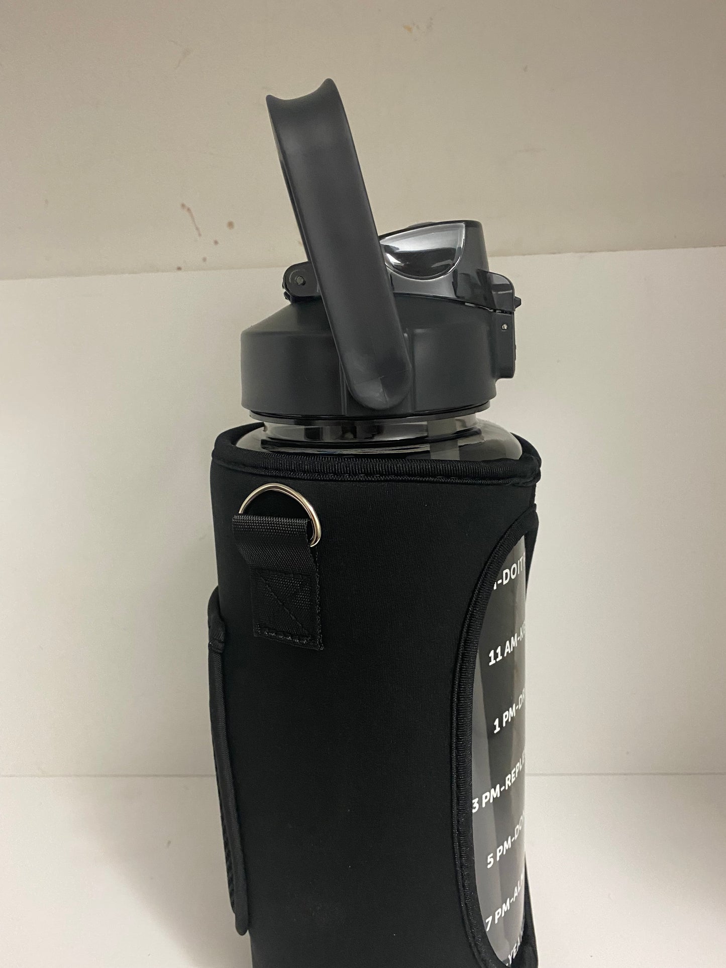Water Bottle With Phone Holder ( 1/2 Gallon) 64 oz.
